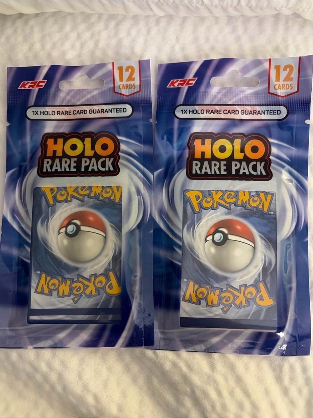 Pokemon Holo Rare Pack - Blue Poké Ball Card Pack (12 Cards)